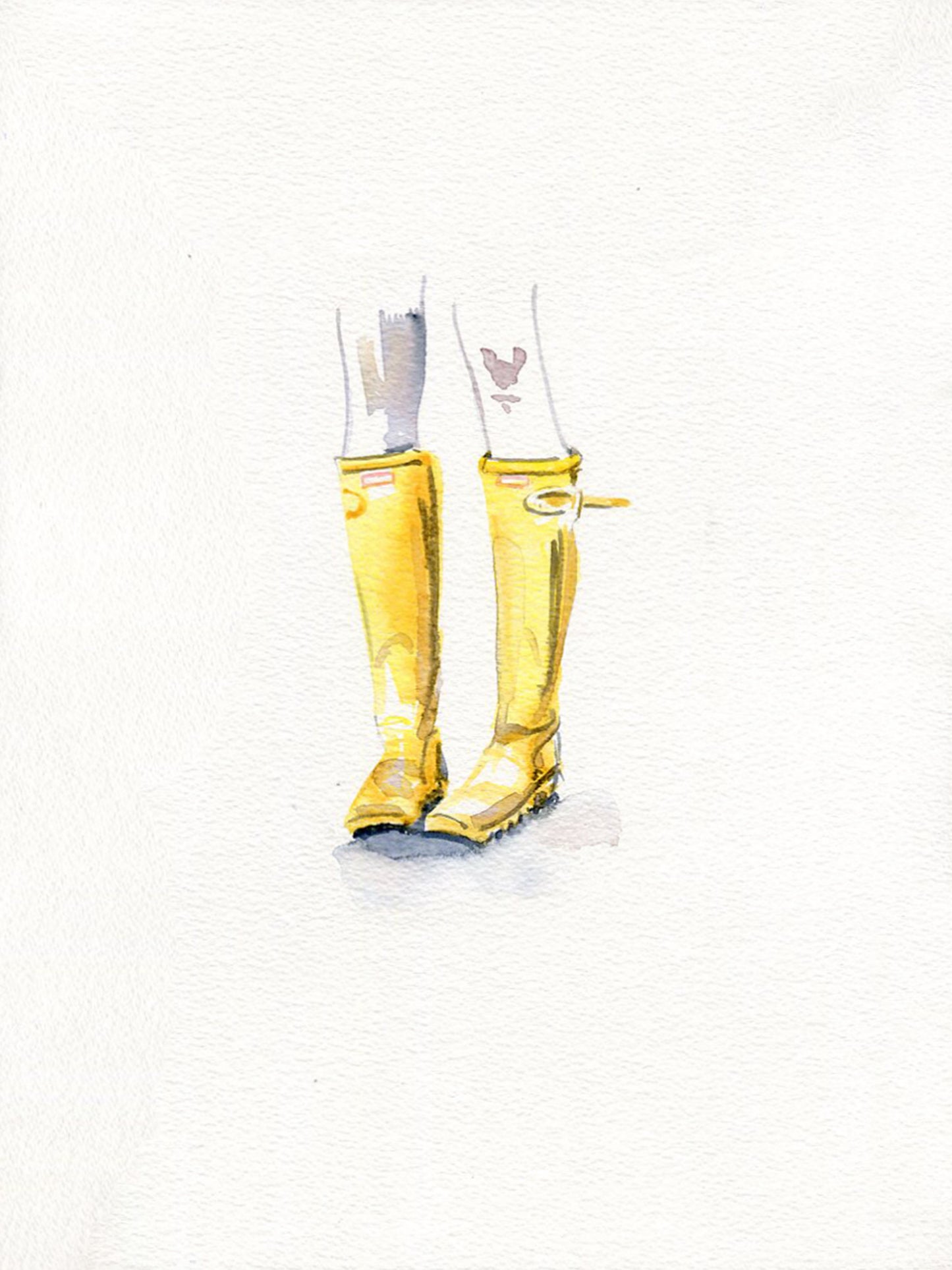 Legs with yellow rubber boots